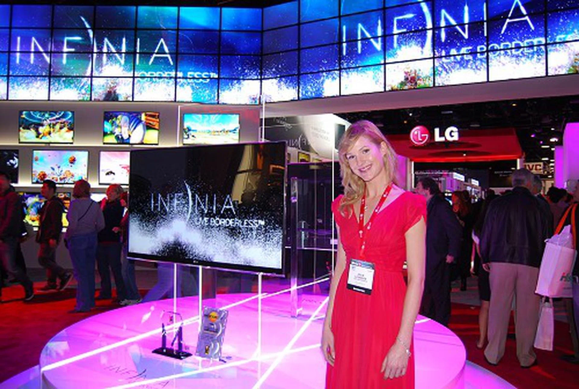 A pretty LG ambassador welcomed visitors to their impressive booth, which was almost encircled completely by LG's new Infinia TVs. Seen here is the top of the line LE9500. To find out more, on its features, check out our previous article in the related links section below.