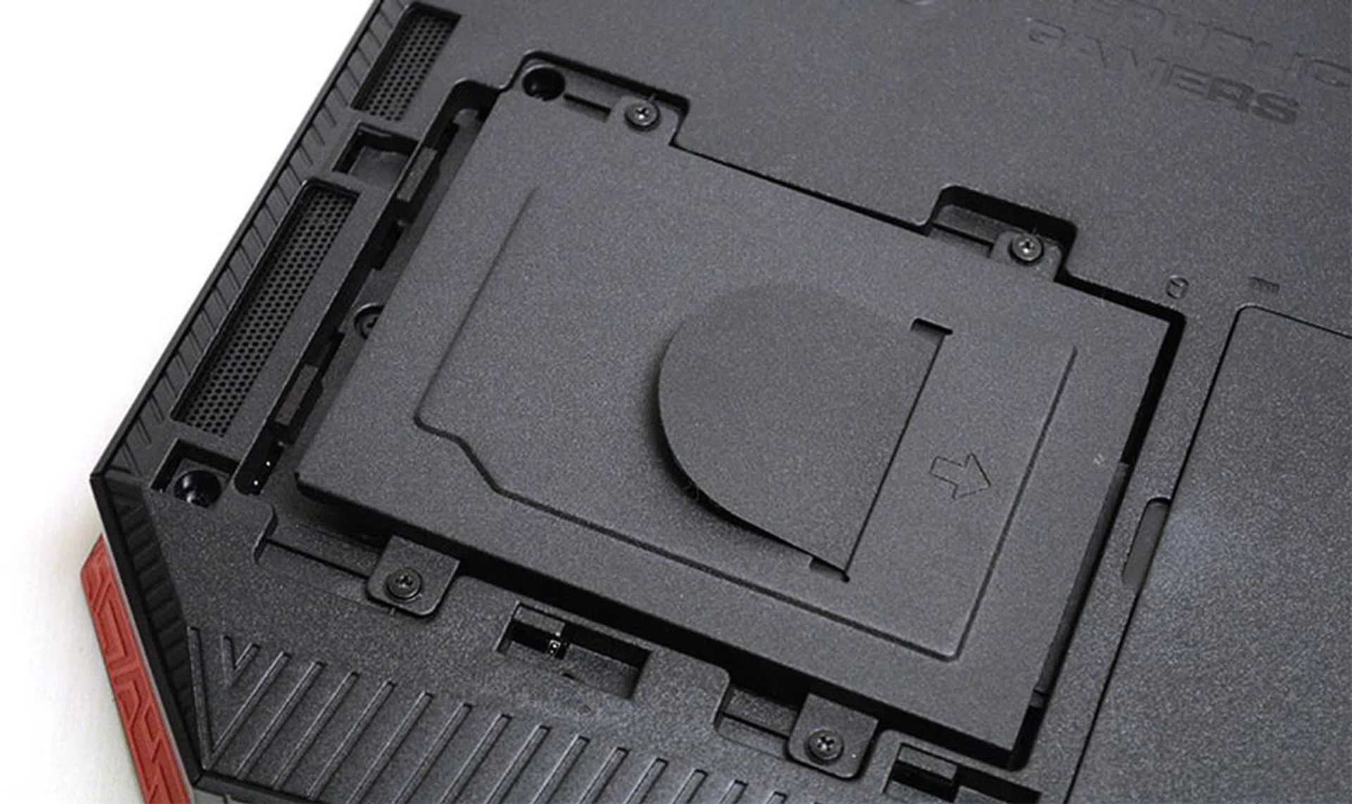 A closer look at the storage expansion bay, and the four screws you'll need to remove.