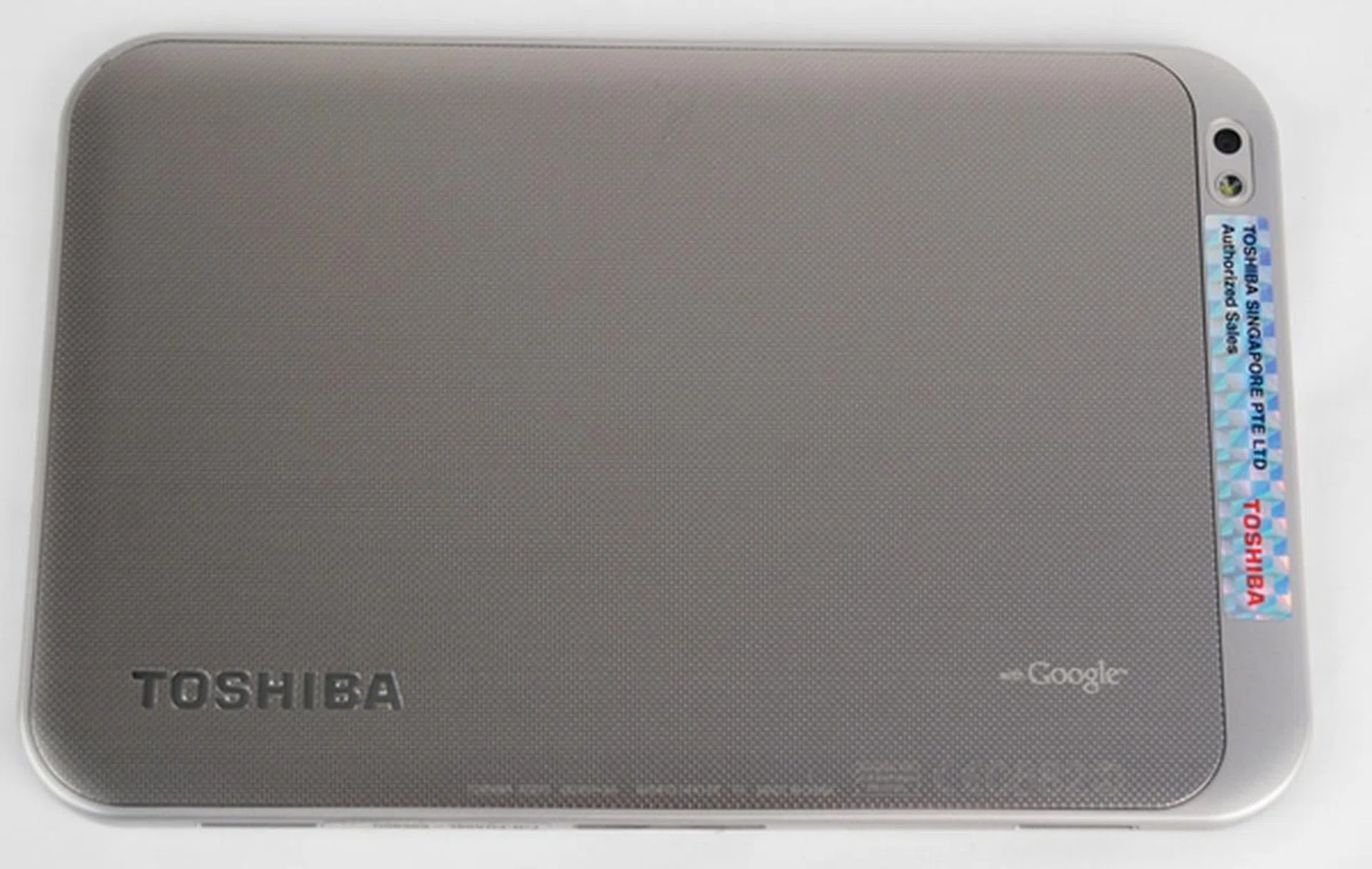 The textured back dominates most of the rear of the tablet. The section where the camera and LED flash are situated is clad in a lighter shade.
