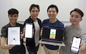 The teams behind the CareCompass (from left: Joshua Gei and Isaiah Tan) and Heartbeat (from right: Chen Zhihan and Royce Hoe) apps. Photo: The Straits Times. 
