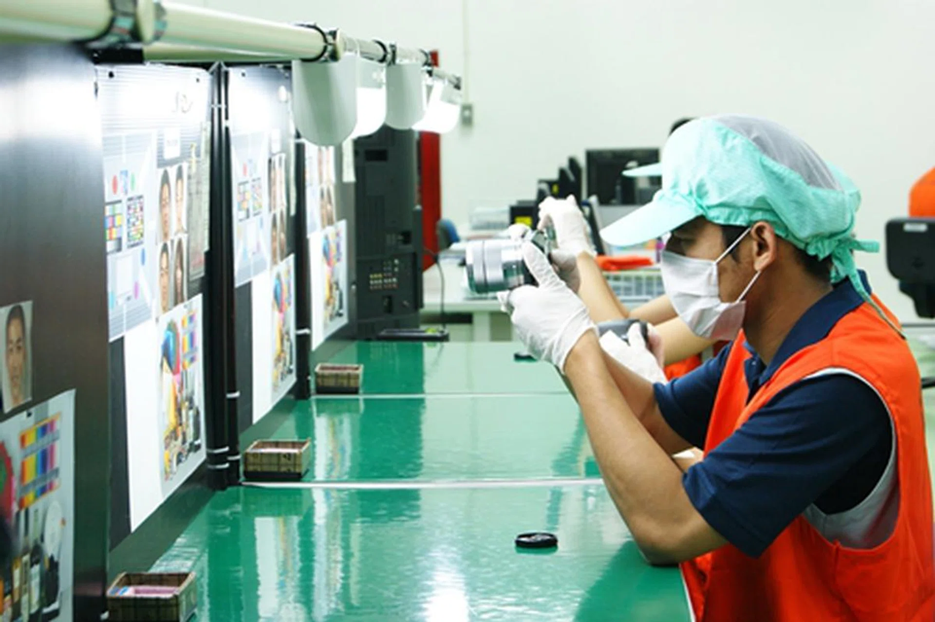 In the Quality Assurance room, workers test the cameras' imaging capabilities with resolution and color charts. During the introductory period, every set is tested. Thereafter, 20 sets per line per shift are tested. (Photo courtesy of Sony)