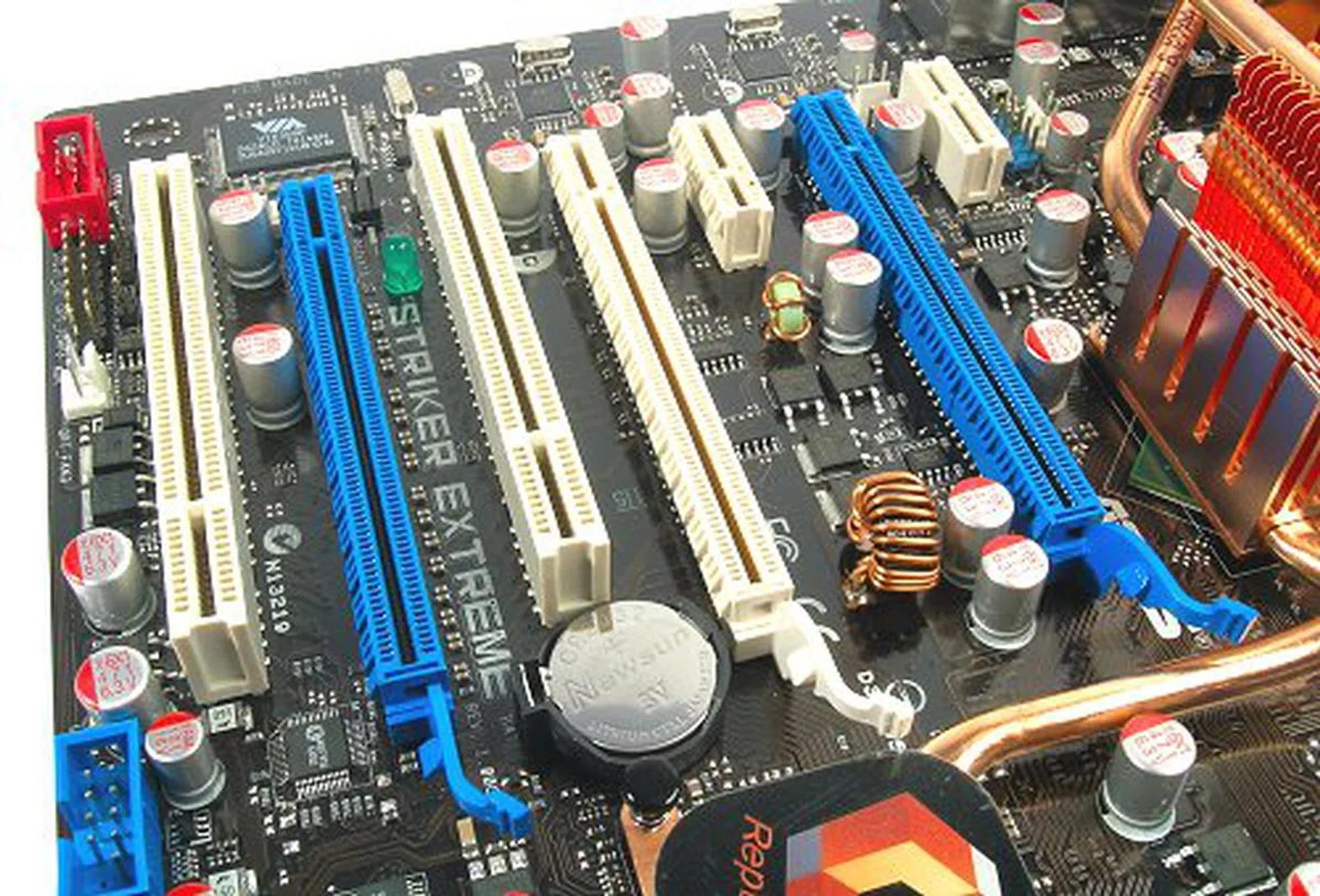 Pretty standard expansion slot layout, except that the topmost slot isn't a PCIe x1, but a proprietary slot for the SupremeFX card.