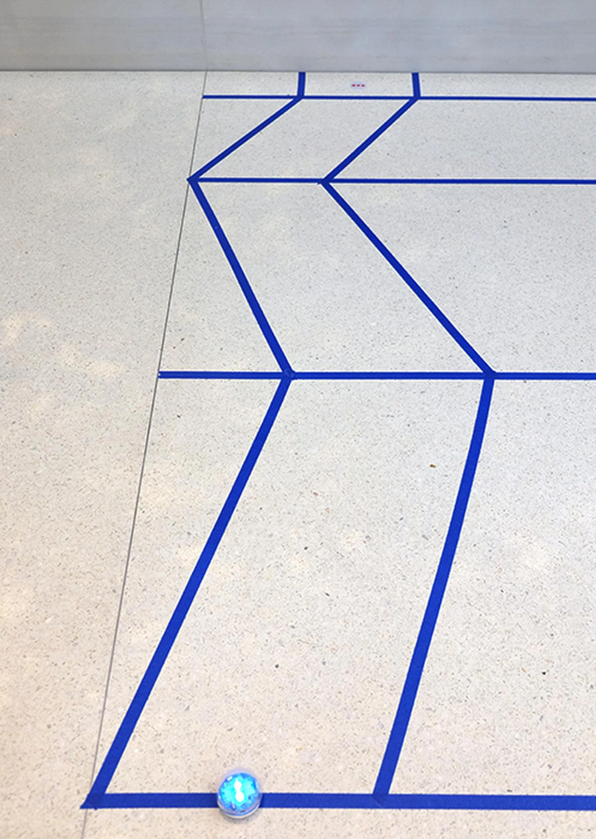 The last mission requires children to program their Sphero to navigate through this zigzag course and onto a small point (marked by a sticker) at the end.