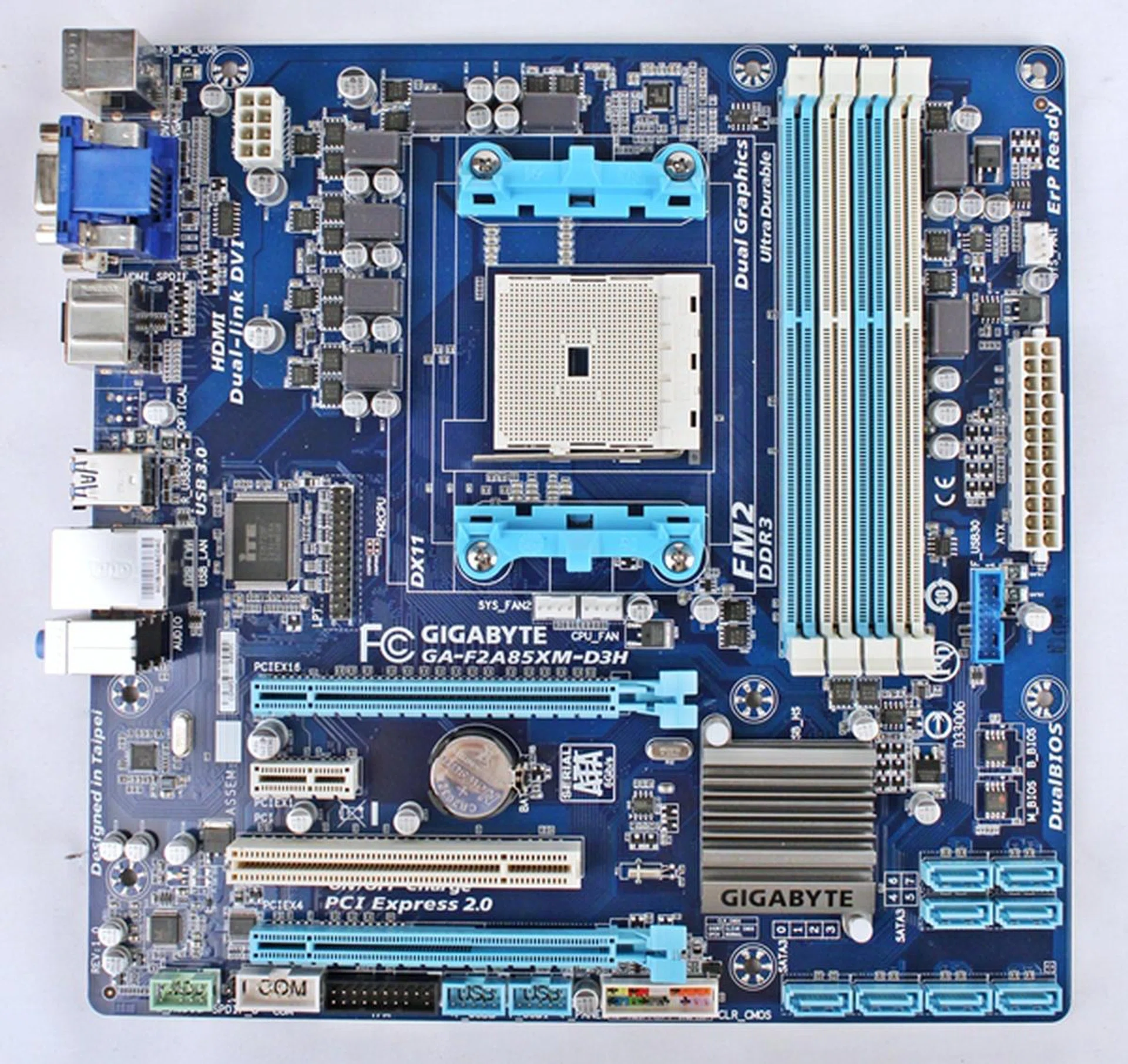The  Gigabyte GA-F2A85XM-D3H mATX board is presented in traditional light blue and white on a medium blue PCB.