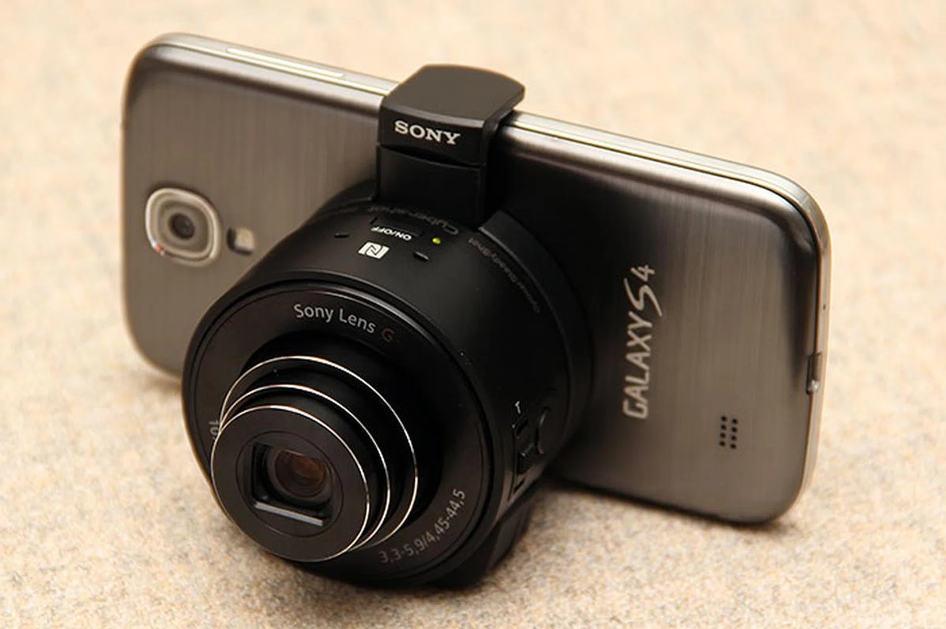 Boom - your smartphone is now a premium 18MP camera with 10x optical zoom!