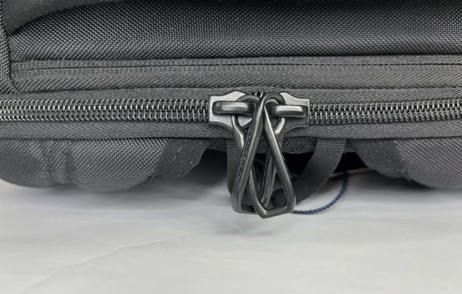 One way to secure the zips is to cross and lock them before securing them with a lock. 
