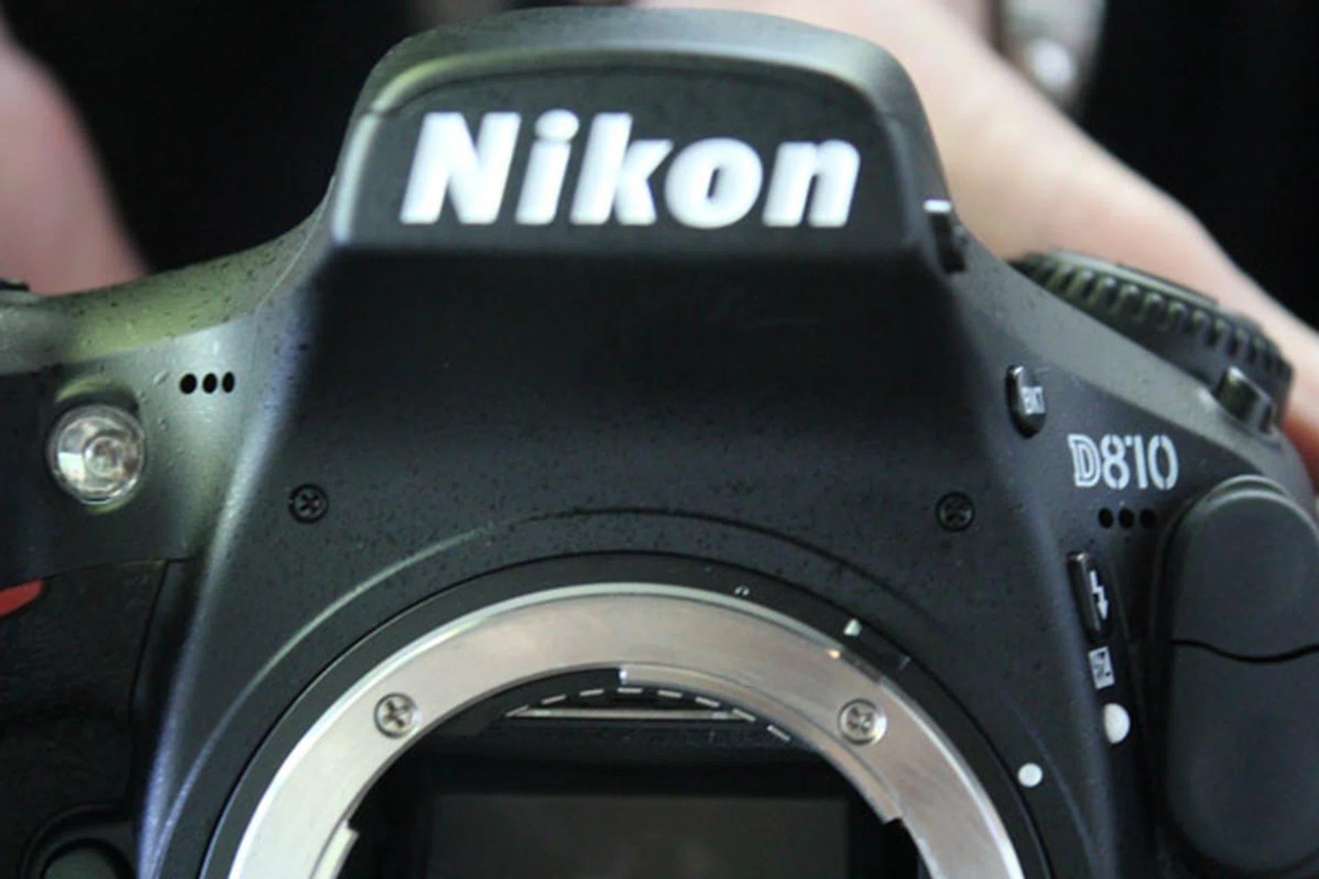 Note the microphone holes on both sides of the pentaprism.