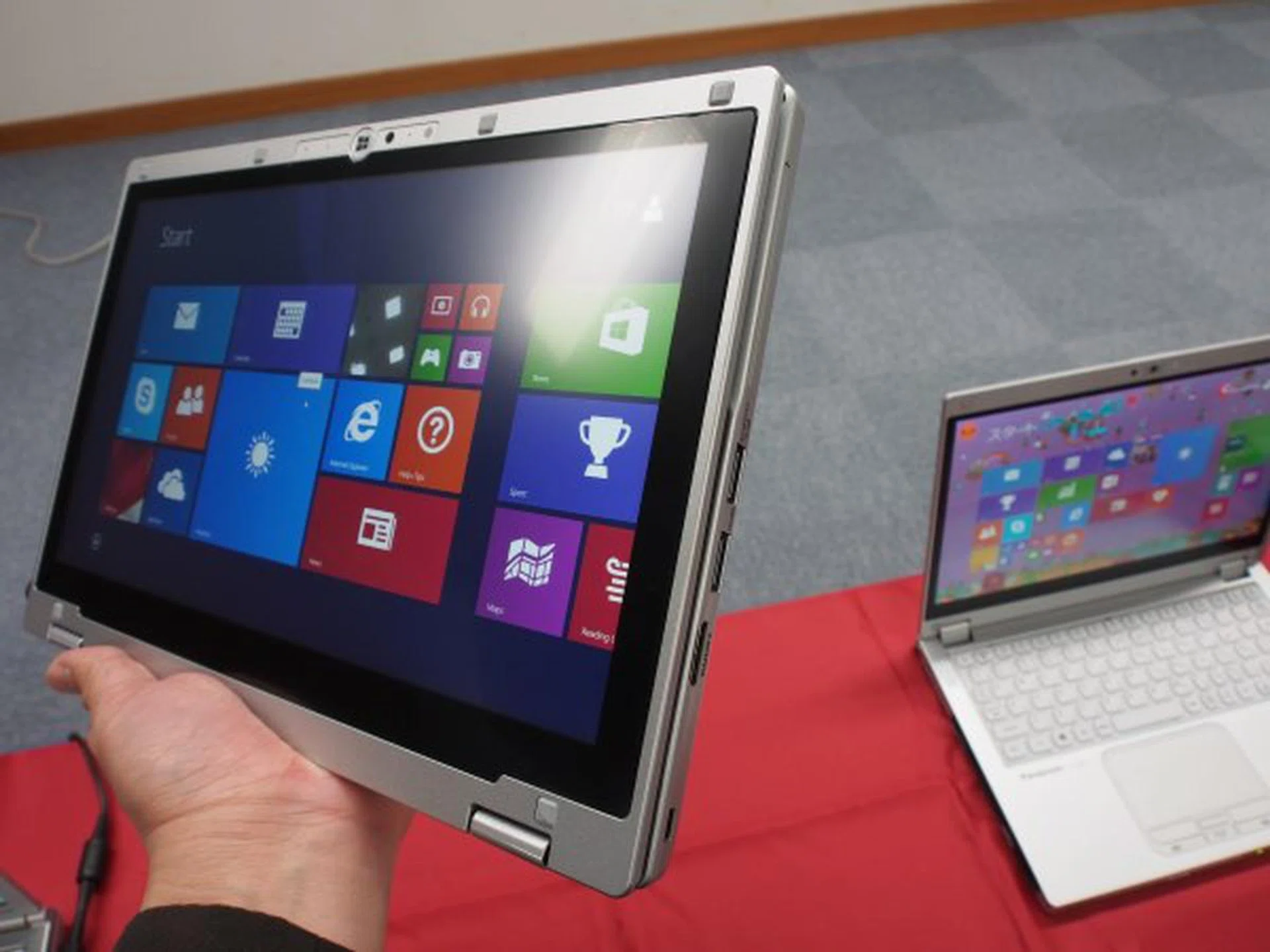 Panasonic proves that business rugged notebooks do not have to look bulky. The CF-AX3 is a super slim 2-in-1 convertible notebook that's lightweight at just 1.135kg, yet can withstand drops from 76cm high and 100kg of pressure.