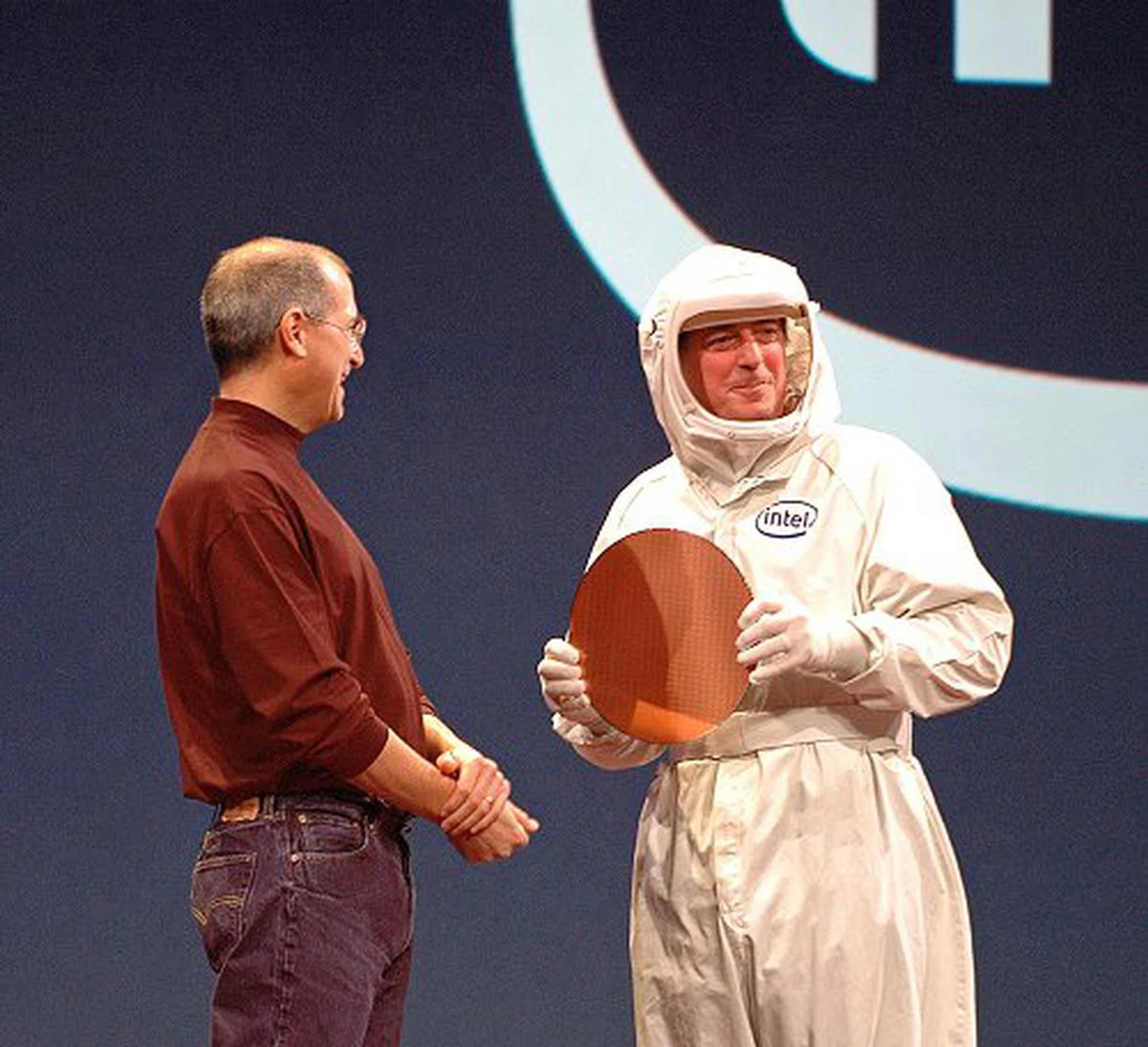 Surprise, surprise! The two industry giants, Steve Jobs (Apple's CEO) and Paul Otellini (Intel's CEO), meet up to make an unprecedented announcement:- A new generation of Macs using Intel processors.