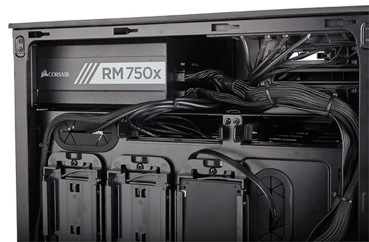 The three 2.5-inch SSD mounts are located at the back of the motherboard tray. (Image Source: Corsair)