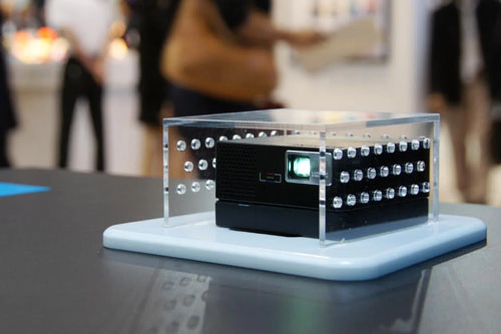 Sitting tucked away in a corner, hidden below a plastic hood, we found the H03 quietly projecting away.