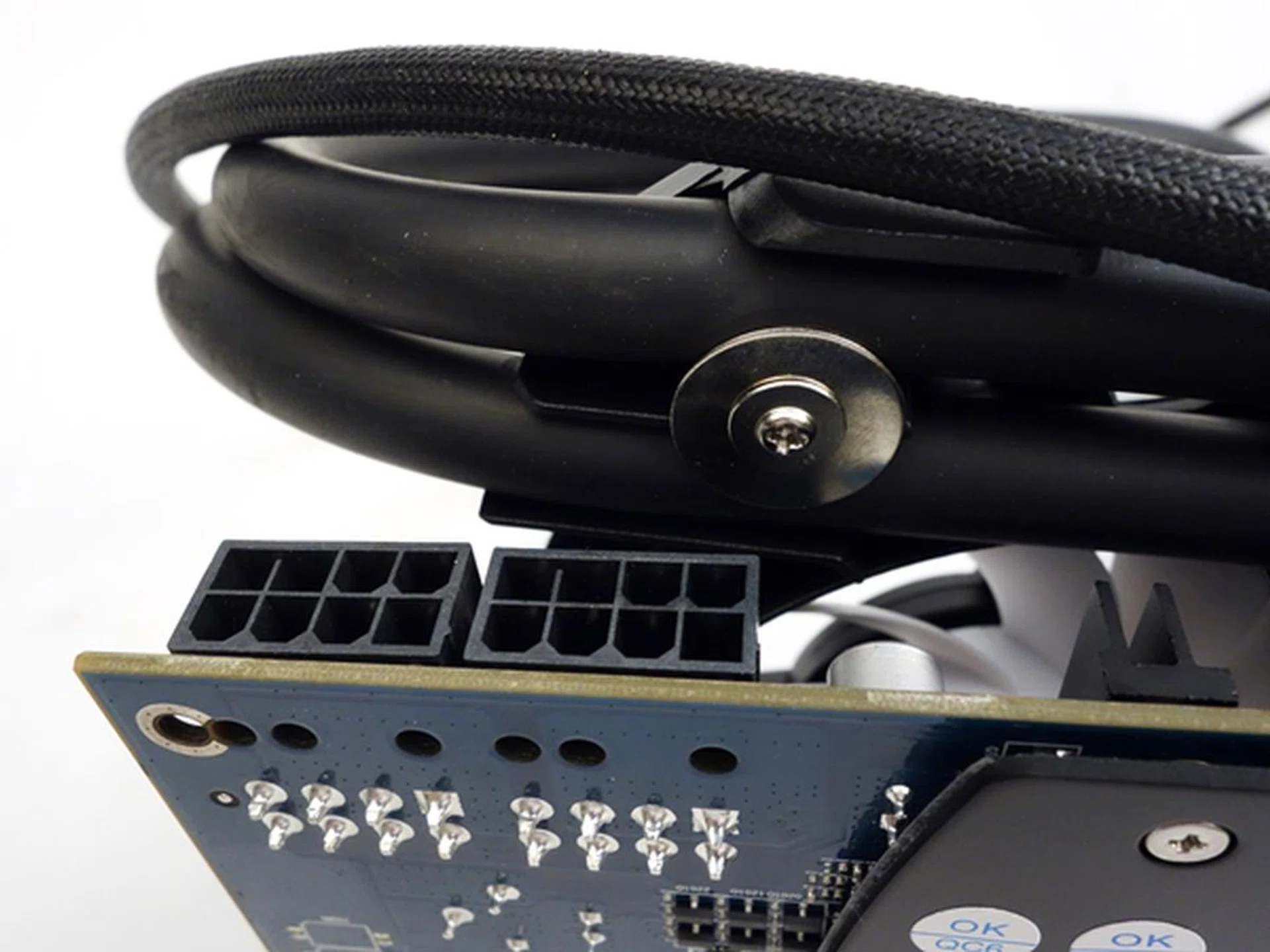 The card has a pair of 8-pin Molex power connectors, with a rated TDP of 300W.