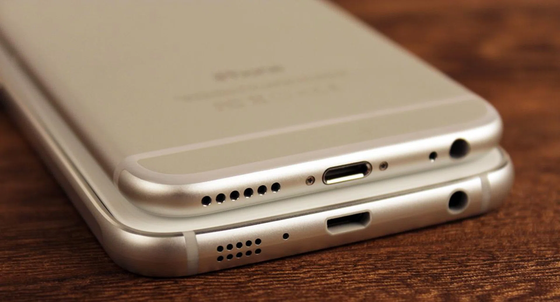 The bottom of the S6 does look an awful lot like the bottom of the iPhone 6, but the rest of the phone is different enough. 