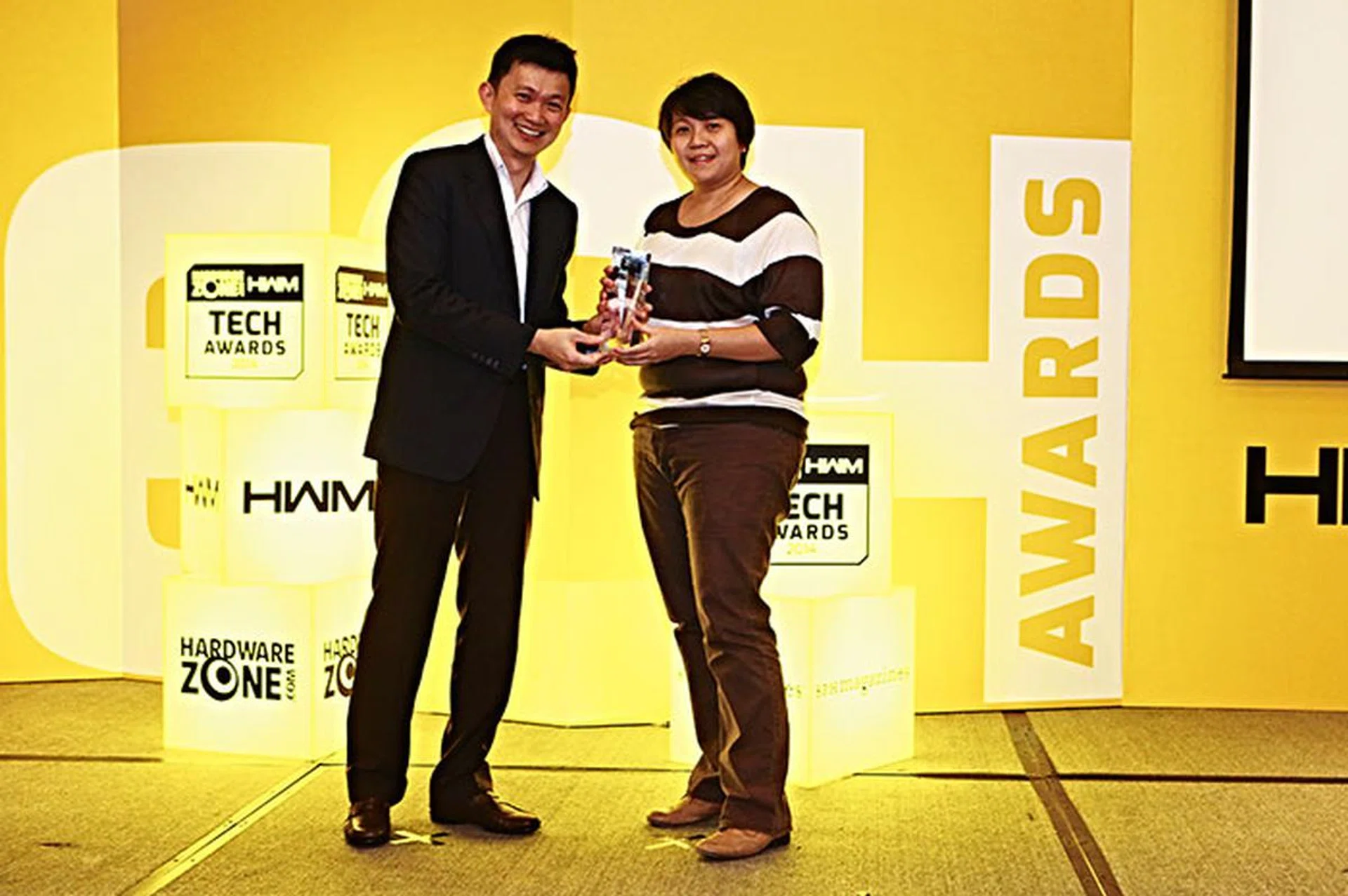Symantec won the Readers' Choice award for Best Security Software Brand. Here's Ms. Erlena Tan, Country Sales Manager, Norton, accepting the award.