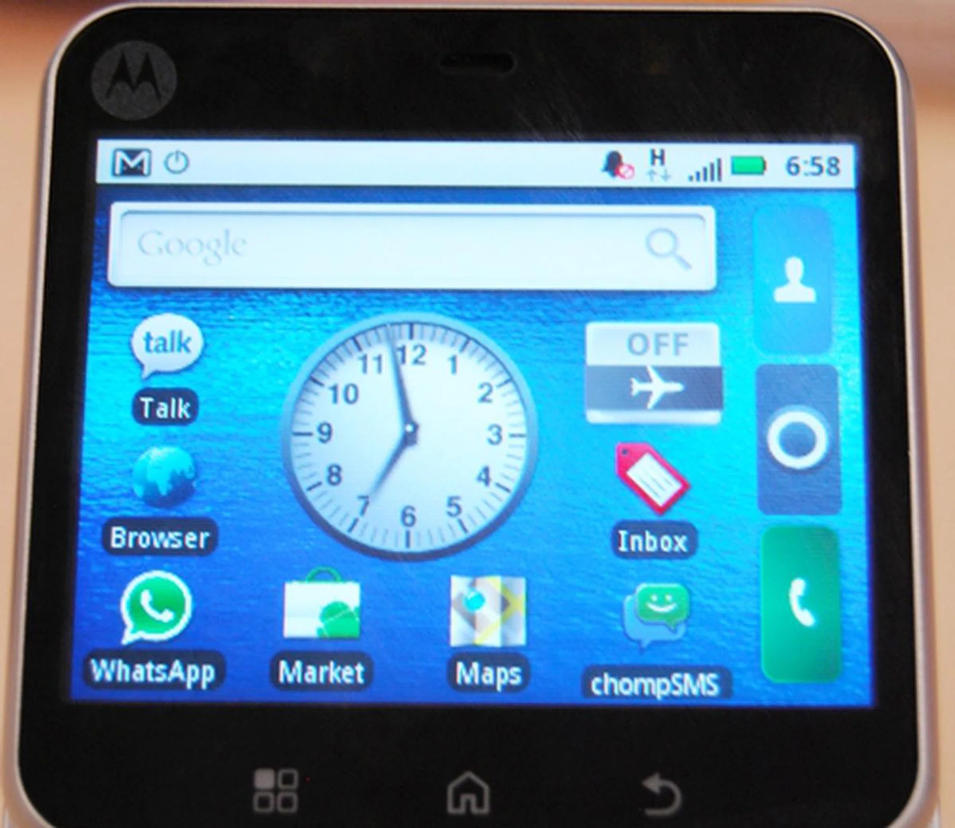 At the bottom (left to right): Settings, Home, Back. To the right (top to bottom): Contacts, Apps Menu, Call.