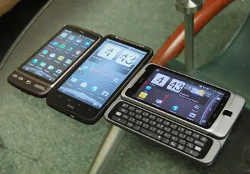 The three Desires, with the HTC Desire HD in the centre, while its left is flanked by the original Desire and on the right, the Desire Z.