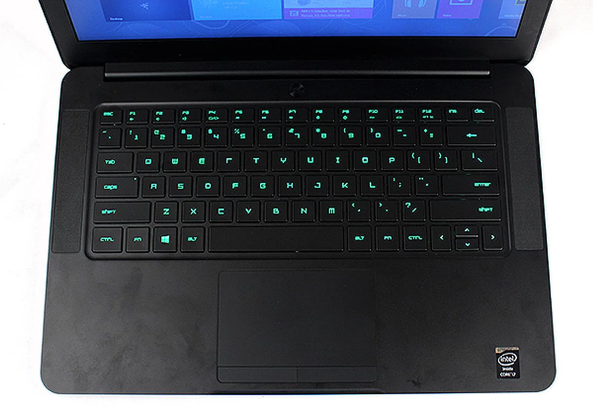 The speakers are located on either side of the keyboard. They are loud and offer surprisingly clear distinction between left and right channels. However, they do sound harsh and cannot hope to compete with proper standalone speakers.