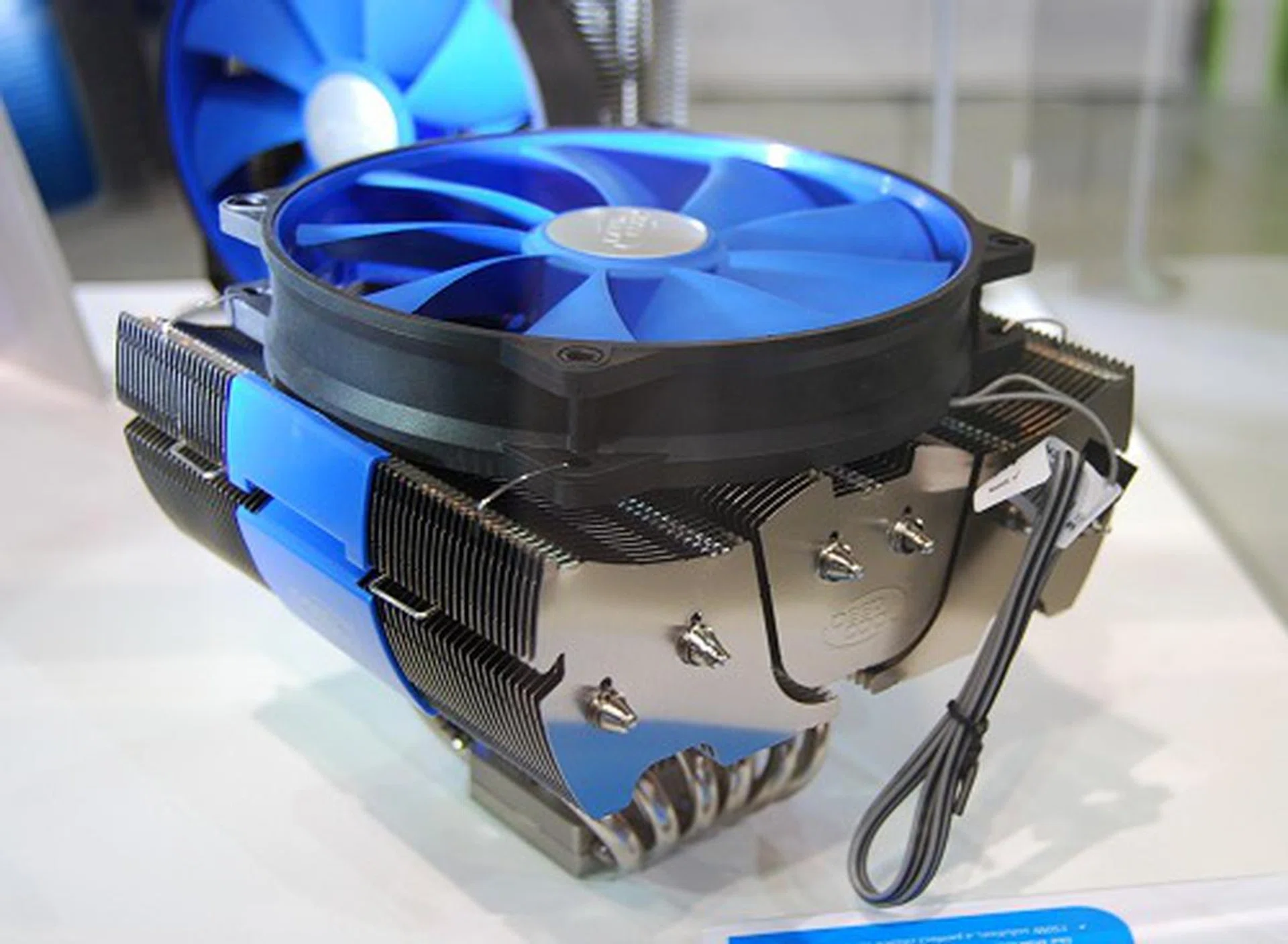 Over at Deep Cool, we noted some extraordinary coolers that are so huge, you might think twice putting it in the casing. Pictured here is Fiend Shark and it comes with multiple locking clips for compatibility with any socket. Specs include a copper base, 6 heat pipes, dense nickel platted aluminum fins with large surface area to dissipate heat quickly, 140mm PWN fan and also designed to cool surrounding components on the motherboard. Now the last part provides more value to buying into a large cooler, especially one that's designed for such.