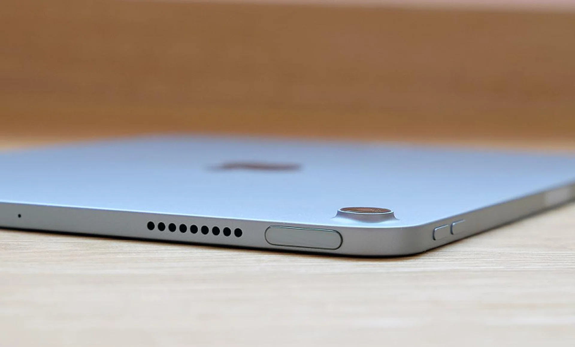 Apple has integrated the Touch ID sensor into the top button.