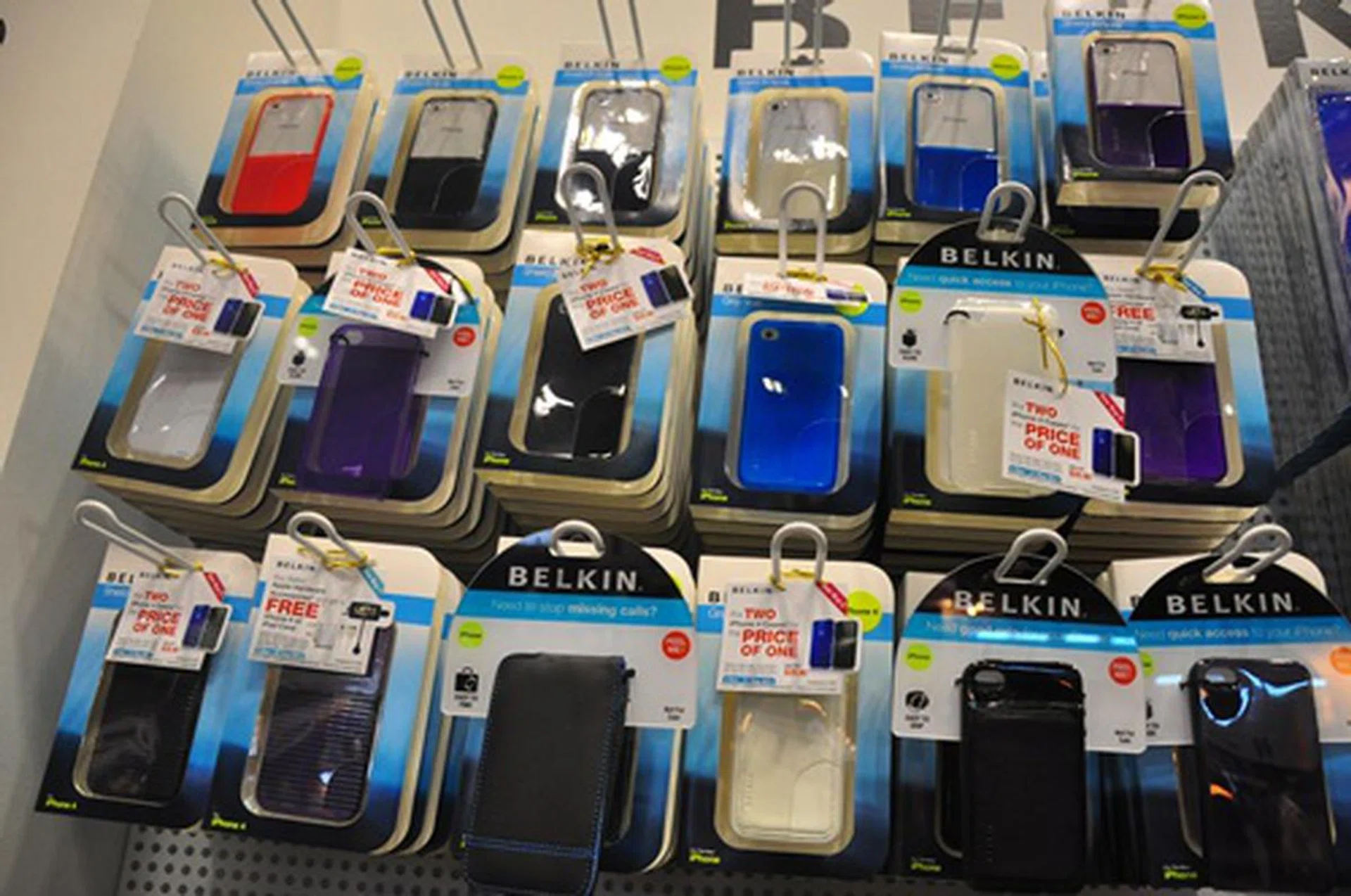 Looking to decorate your iPhone 4 without burning a hole in your pocket? The booth at Belkin comes with a varied selection with some costing $28.90 for two.