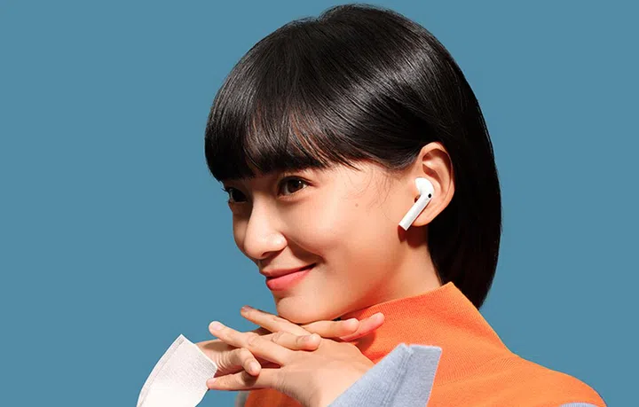 "Oooh, only S$49?" - model talking about Xiaomi Redmi Buds 3, probably.