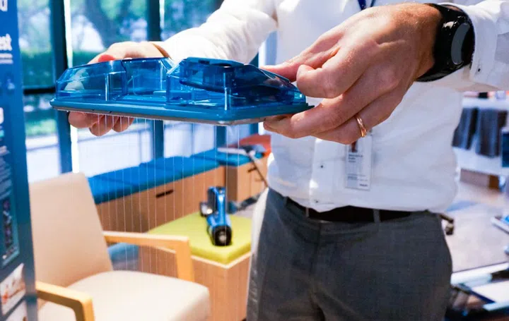 A light step on the tank head will release water for mopping.