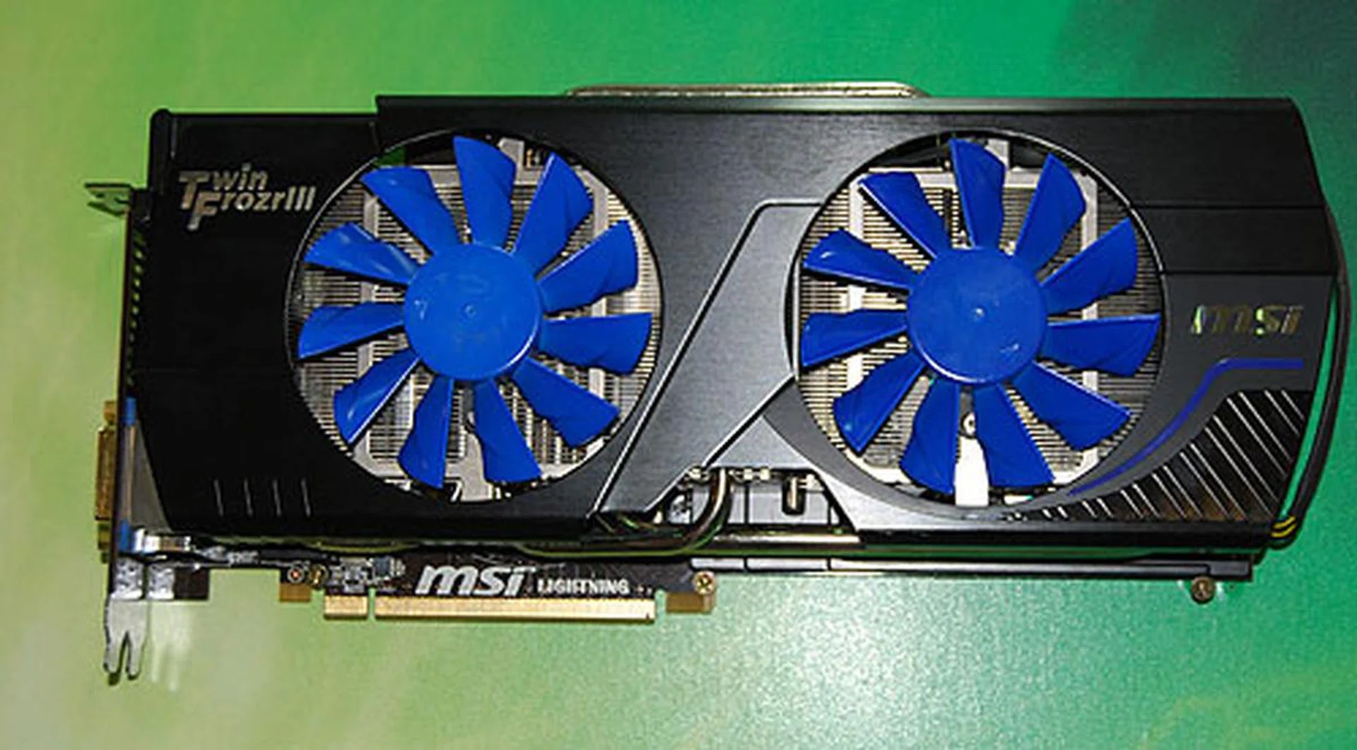 The MSI N580GTX Lightning Xtreme Edition has 3GB of GDDR5 memory instead of the usual 2GB. It also has a neat cooler where the fins of the fan will turn from its initial blue to white as the temperature increases, so one can check at a glance how warm the graphics card is at. The threshold for this Smart Temp Sensor feature appears to be 45 degrees Celsius, before the fins starts to turn significantly white.