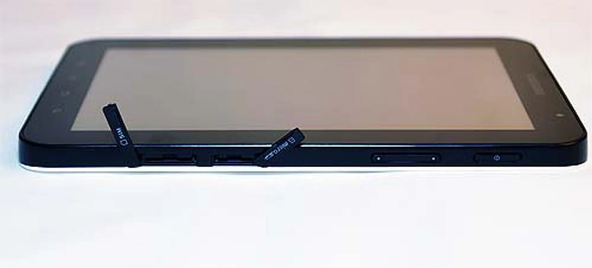 Located at the right side, you'll find a micro-SD slot (with an expansion card support up to 32GB) and the SIM card slot. Since the tablet can work as a phone, it's probably a good idea to pick up a Bluetooth headset too unless you want everyone to hear your phone conversation.