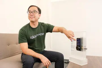 Anthony Chow, CEO and co-founder of Igloohome, shows me the Deadbolt 02, a smart lock that doesn’t require Wi-Fi to work.