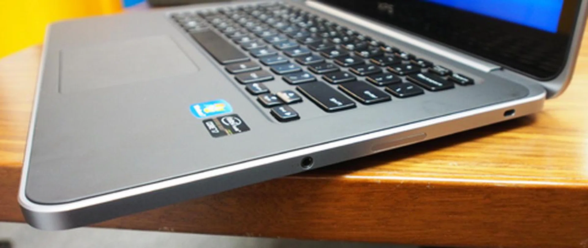 The right side looks sparse by comparison, with just the headphone/microphone jack, multi-card reader and Kensington lock here.