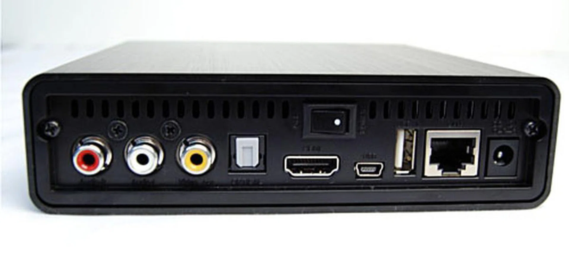 Besides a standard set of outputs like composite, HDMI, optical output and a LAN jack, a power switch and a Mini-USB port surprised us