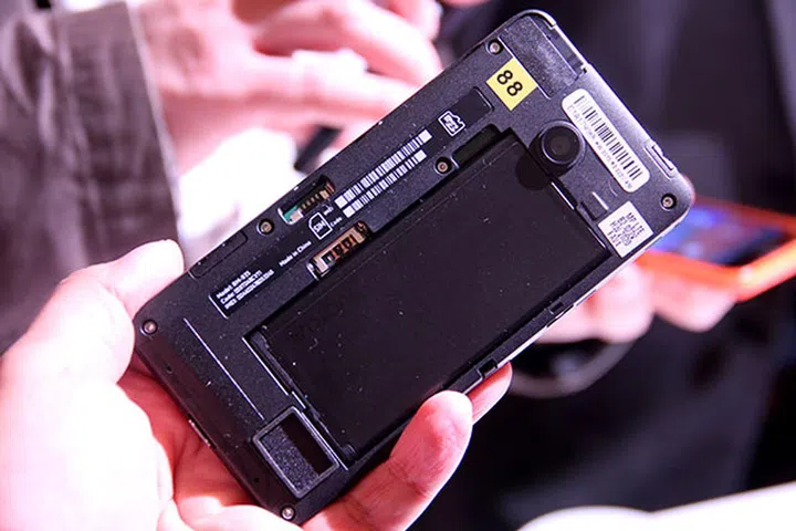 Pulling off the rear cover will give you access to the SIM and microSD card slots.