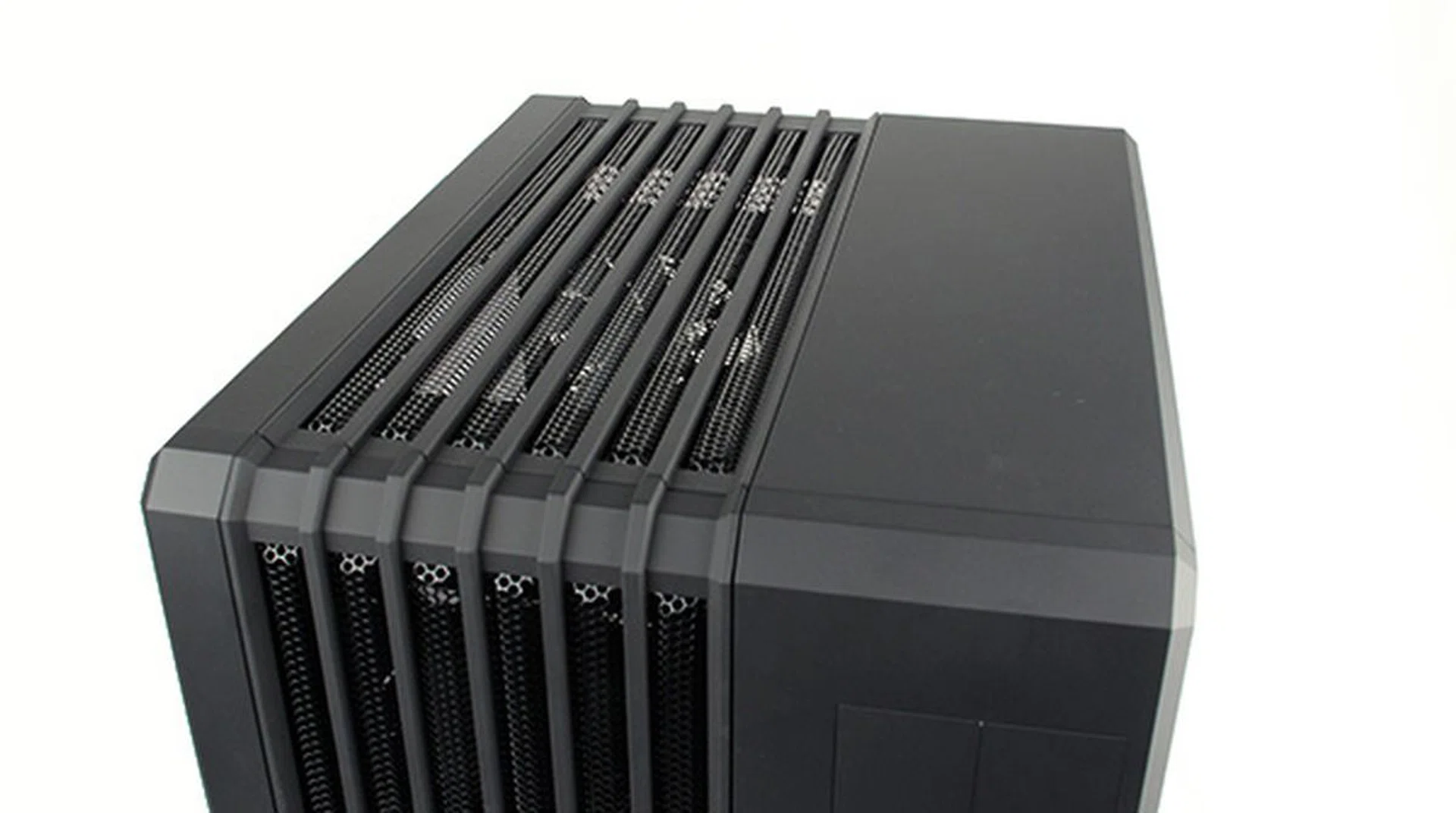 The top panel is pretty nondescript save for the removable grille.