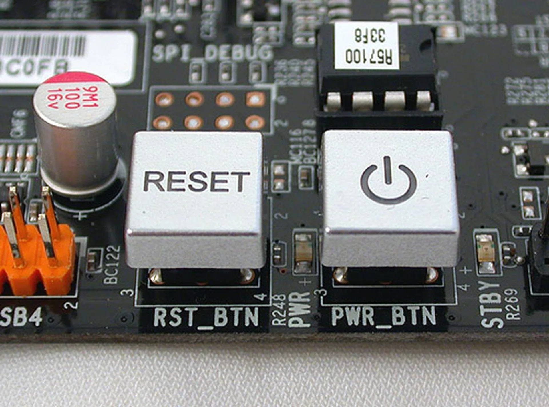 Power and reset buttons for those who run their boards out of the casing. They are not the pretty, glowing kinds we have seen before but they get the job done.