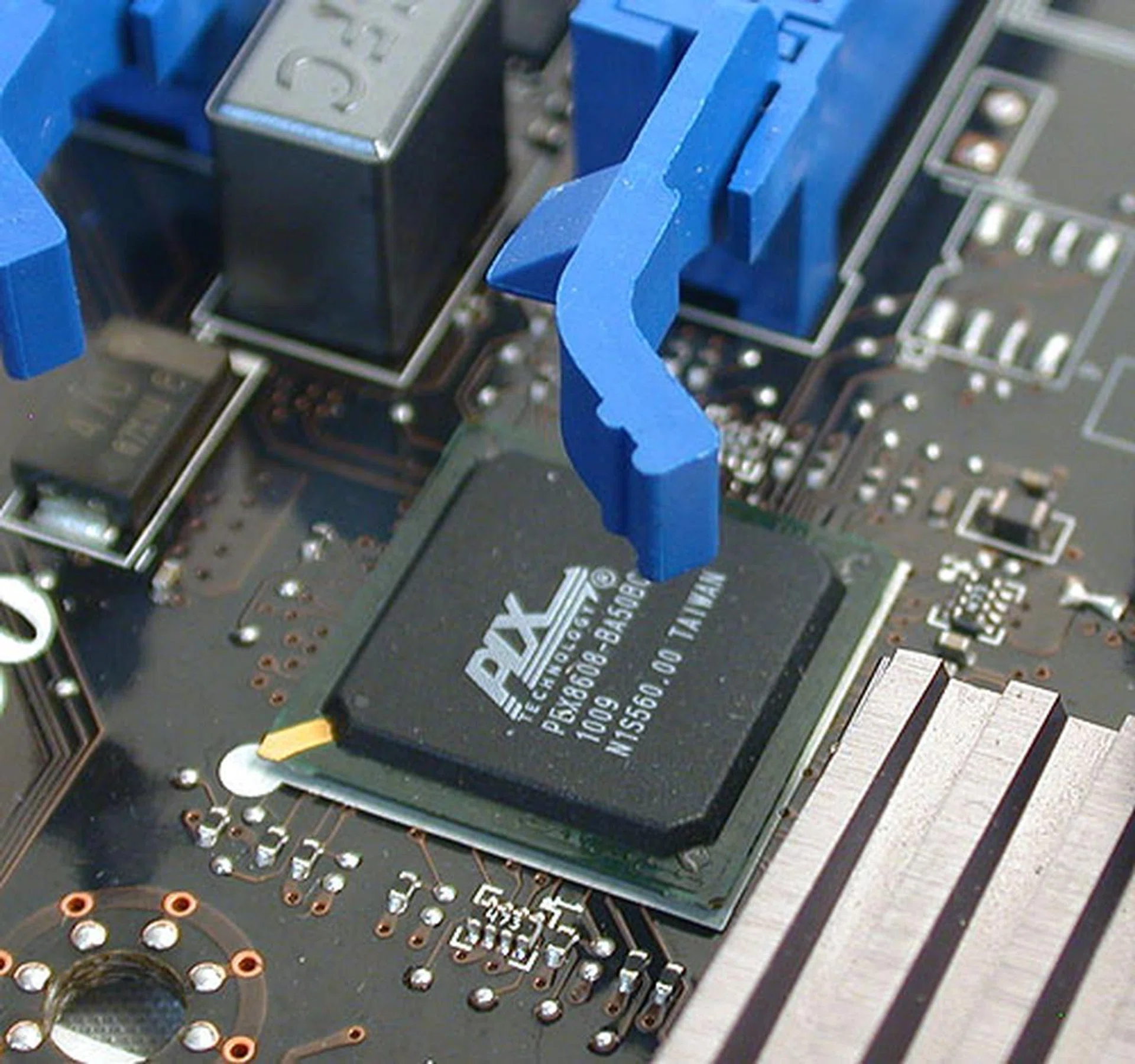 PLX's PEX 8608 PCIe chip adds more lanes for use by USB 3.0 and SATA controllers so that they won't need to tap into the PCIe lanes reserved for graphics and other expansion cards.