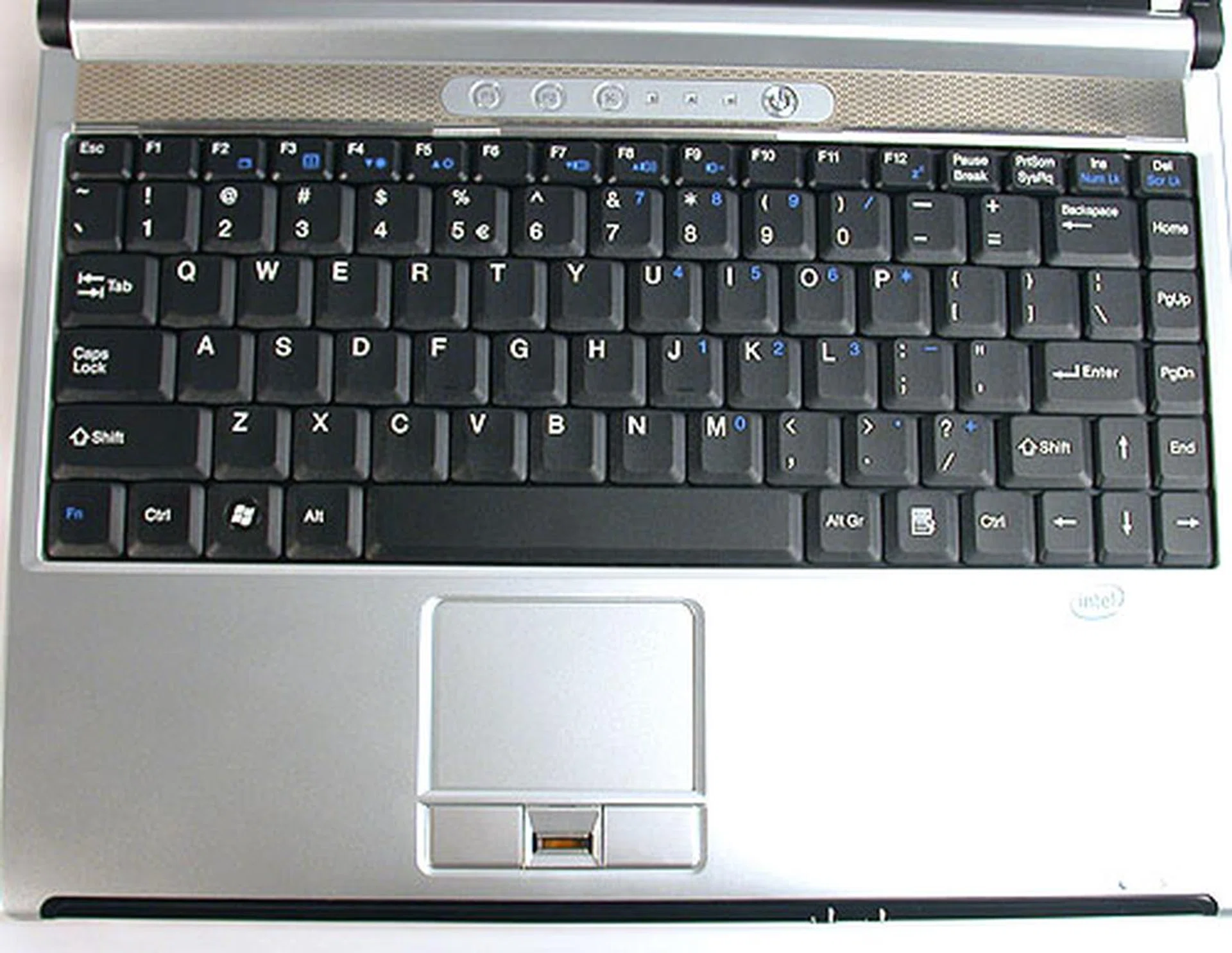 A standard compact keyboard and touchpad. The fingerprint sensor is located between the buttons, which felt a bit stiff and plastic.
