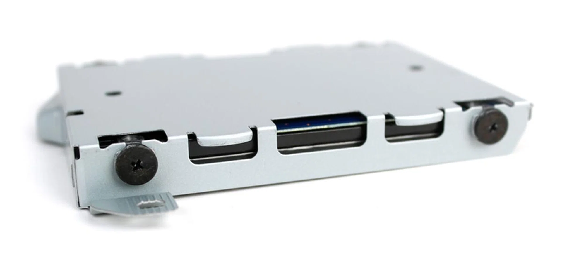 The HDD is mounted into its chassis via four black screws. Unscrew them and remove the HDD.