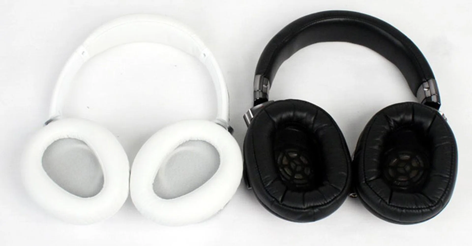 The difference in the shape of the ear-cups of the two headphones is evident here. The Sony MDR-10R (left) has more ergonomically shaped cushioning while the Sony MDR-1R's (right) cushions are much larger and oblong.