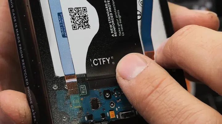 JerryRigEverything points out the "11-11-11" motif on the back of Casetify's Samsung phone case, which is actually an easter egg that celebrates dbrand's founding date. The "glass is glass and glass breaks" slogan is also an added easter egg by JerryRigEverything, since the original Samsung teardown does not include these tags. Source: JerryRigEverything.