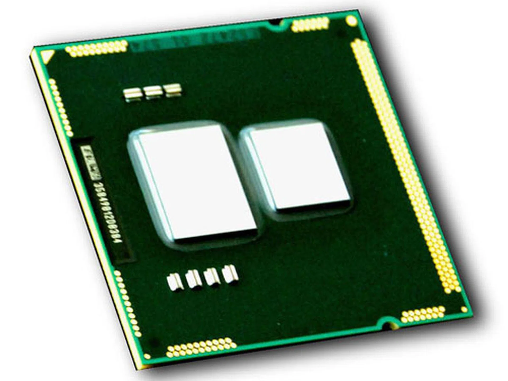  The Clarkdale processor without the thermal lid. The larger chip on the left is the 45nm GPU while the smaller die on the right is the 32nm Westmere core.  
