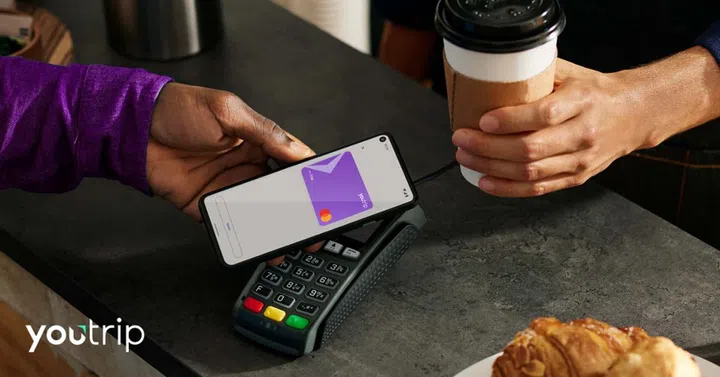 Paying using YouTrip, but through your Android phone's payment communicator instead.