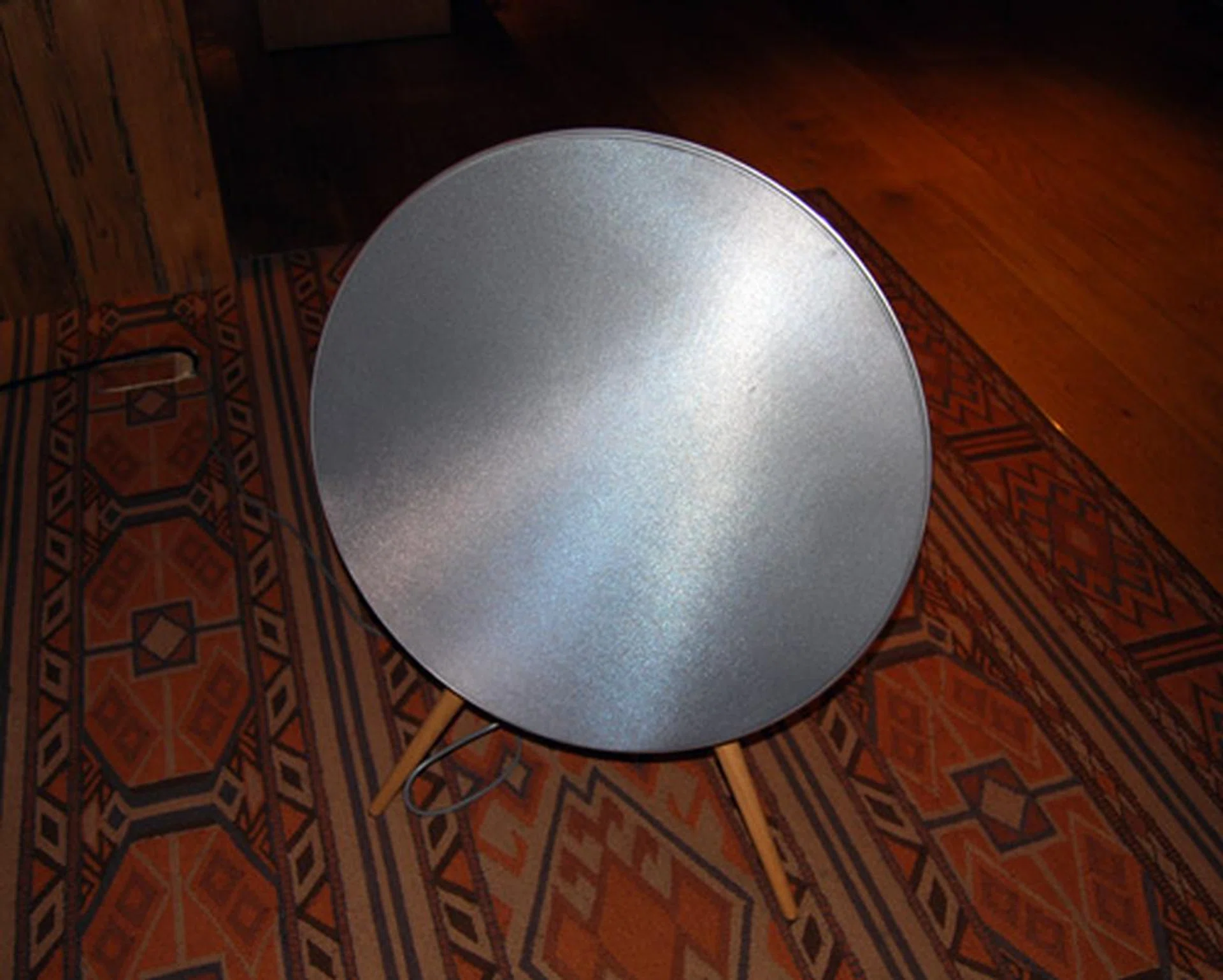 The BeoPlay A9 speaker's unique looks are sure to be a conversation starter. Here you can see the product pretending to be a satellite dish.