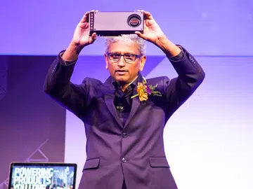 Raja Koduri, senior vice president and chief architect, Radeon Technologies Group, AMD, showing off the new Radeon RX 480 graphics card.
