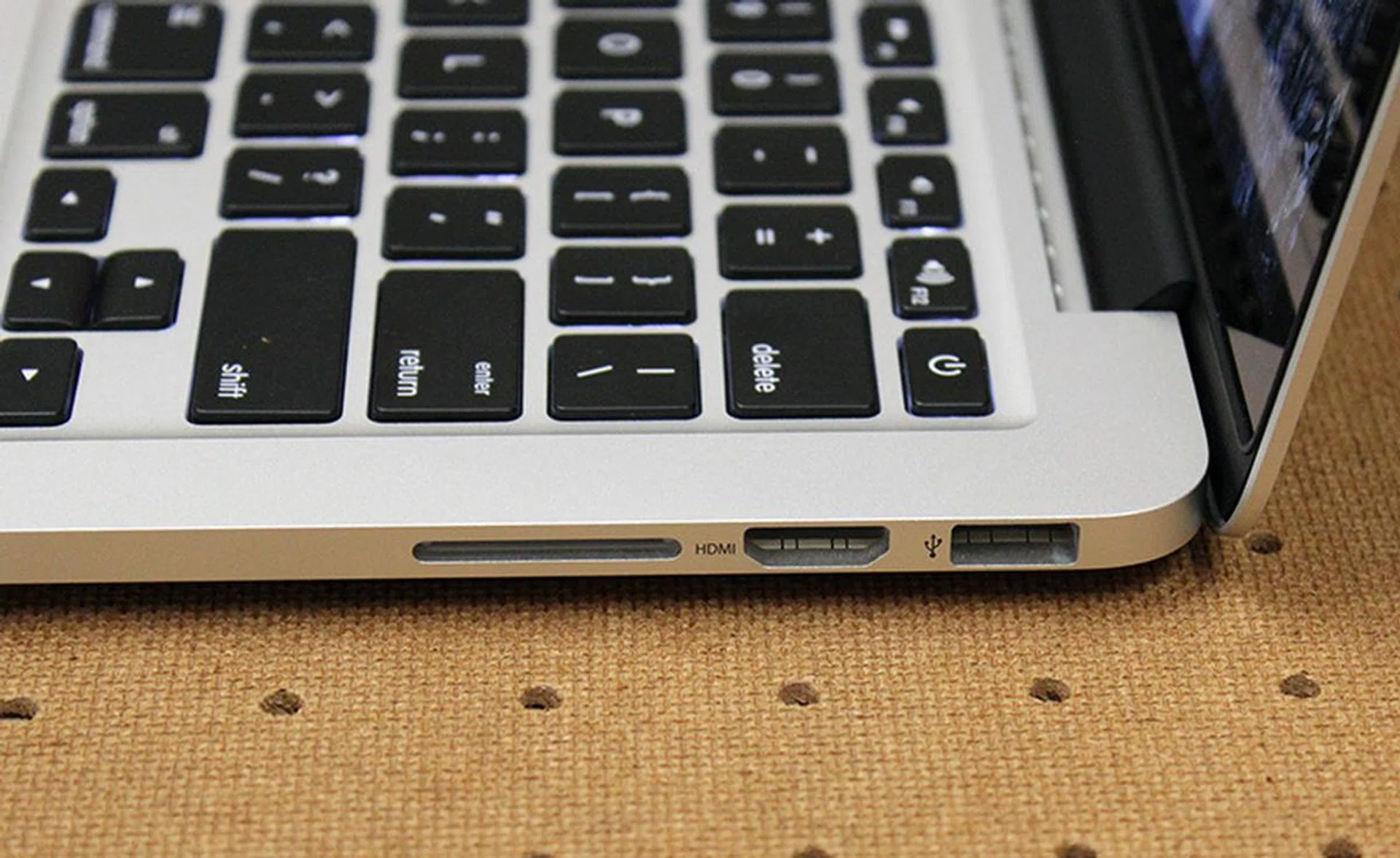 On the right side, there's the SDXC card reader, HDMI port and second USB 3.0 port.