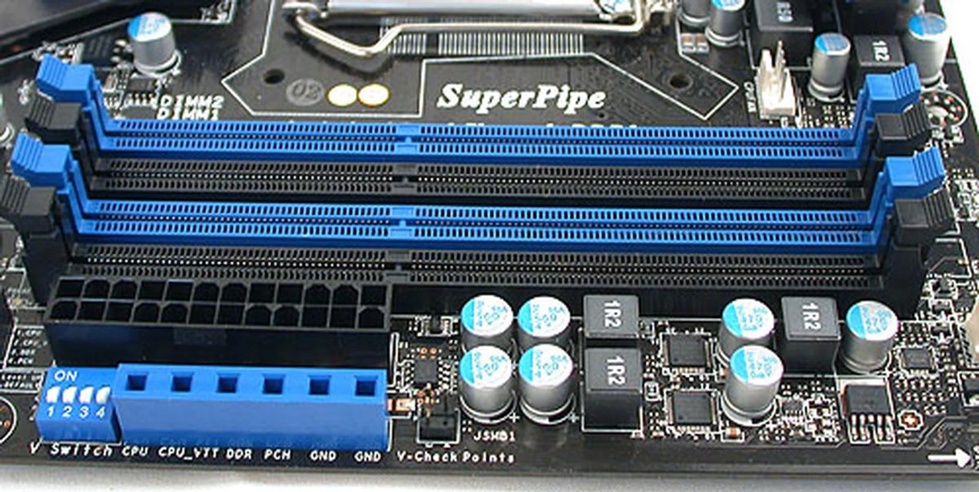 Four DIMM slots and the ATX power connector. All very ordinary so far. But what's this? MSI takes a leaf out of ASUS' book with a voltage check interface (in blue) that is functionally similar to ASUS' ProbeIt. You'll need a multimeter of course.