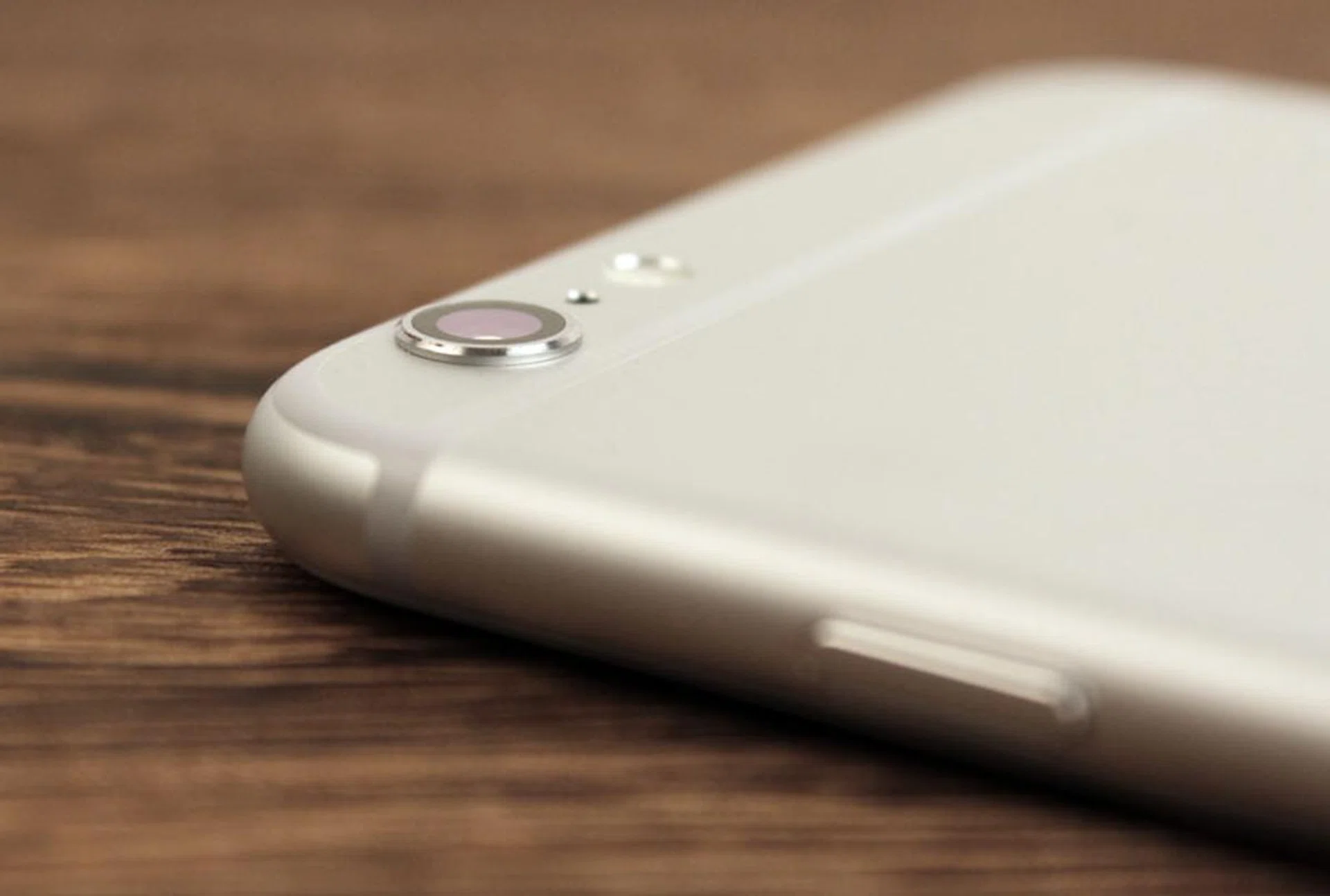 On both phones, the camera module sticks out about half a millimeter.