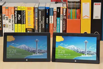 The same 10.6-inch screen size, the same front-facing camera placement, the same 18mm black bezel, the same capacitive Windows logo button - can you tell which one is Surface RT and which one is Surface Pro? (Hint: the Surface Pro is 1mm taller.)
