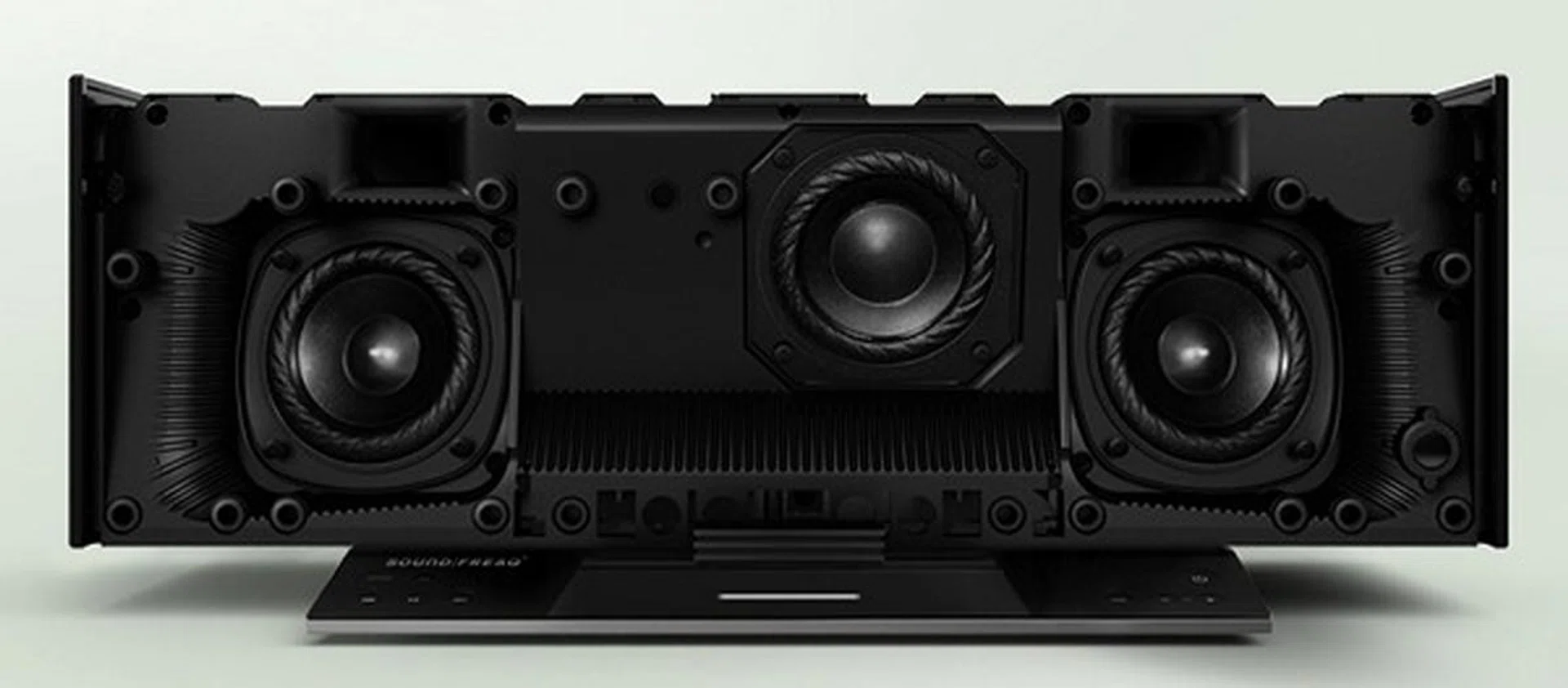 Inside the Soundfreaq SFQ-03 Sound Stack dock, you can clearly see the 2.2-speaker configuration: dual main speakers on the sides with the subwoofers in the middle (because they are designed with a push-pull config,  the secondary sub is situated behind the front facing one). Image source: Soundfreaq.