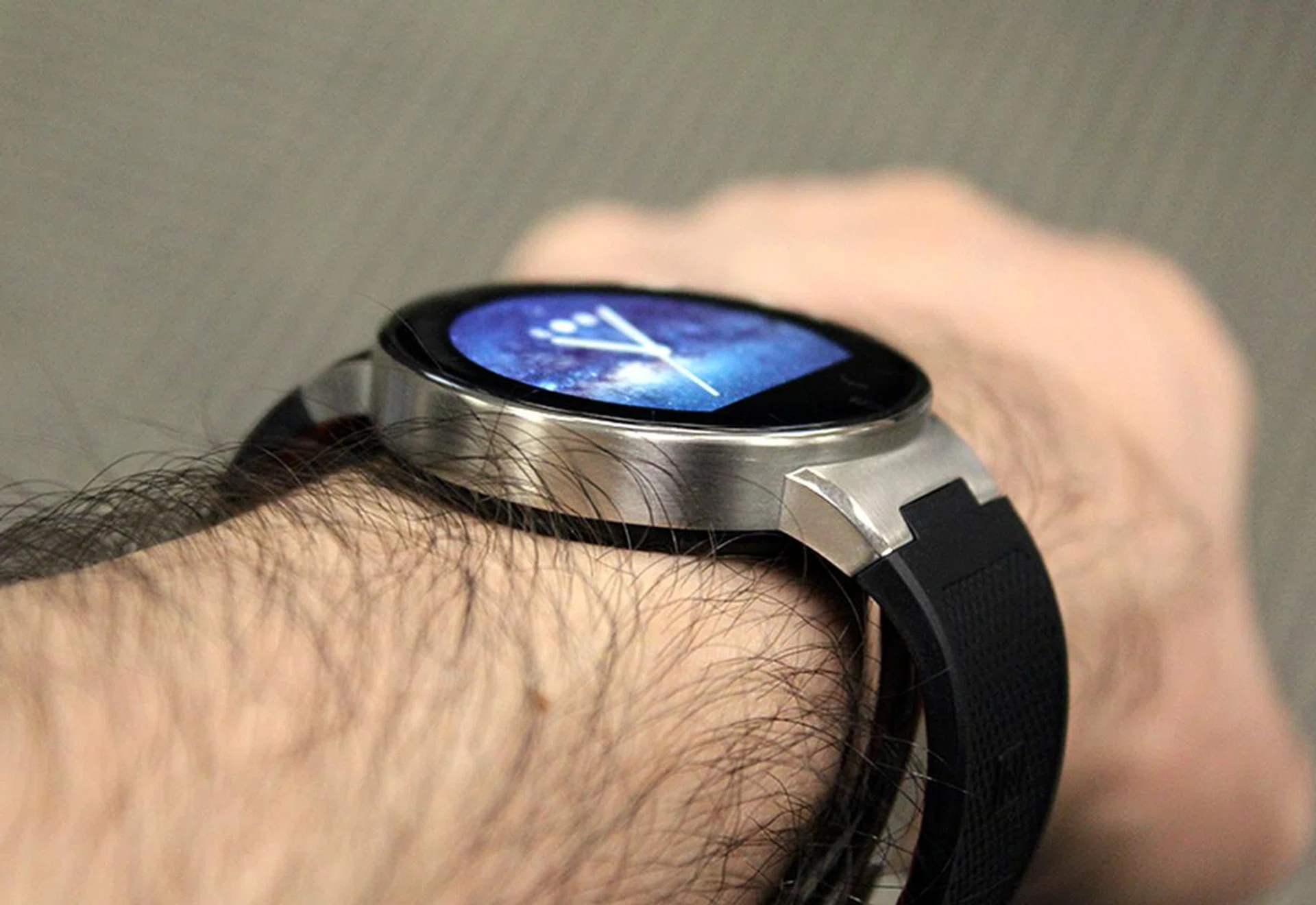 The Alcatel OneTouch watch is actually fairly thin, but its stiff strap lets it down and makes it uncomfortable to wear.