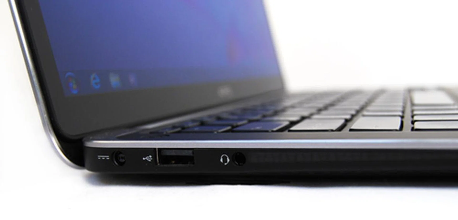Along the left back side you'll find: Power, USB 2.0 and  a headphone/microphone combi-port.